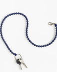 Porte-Clés long en perles - bois peint