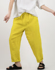 Pantalon Lijili Manuelle Guibal, en couleur jaune fluo