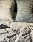 Grand coussin en lin coloris divers