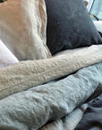 Grand coussin en lin coloris divers
