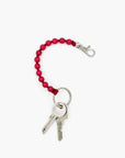 Petit porte-clés en perles - bois peint