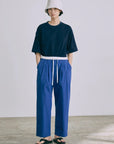 Pantalon Haku Nicholson & Nicholson en coton bleu roi