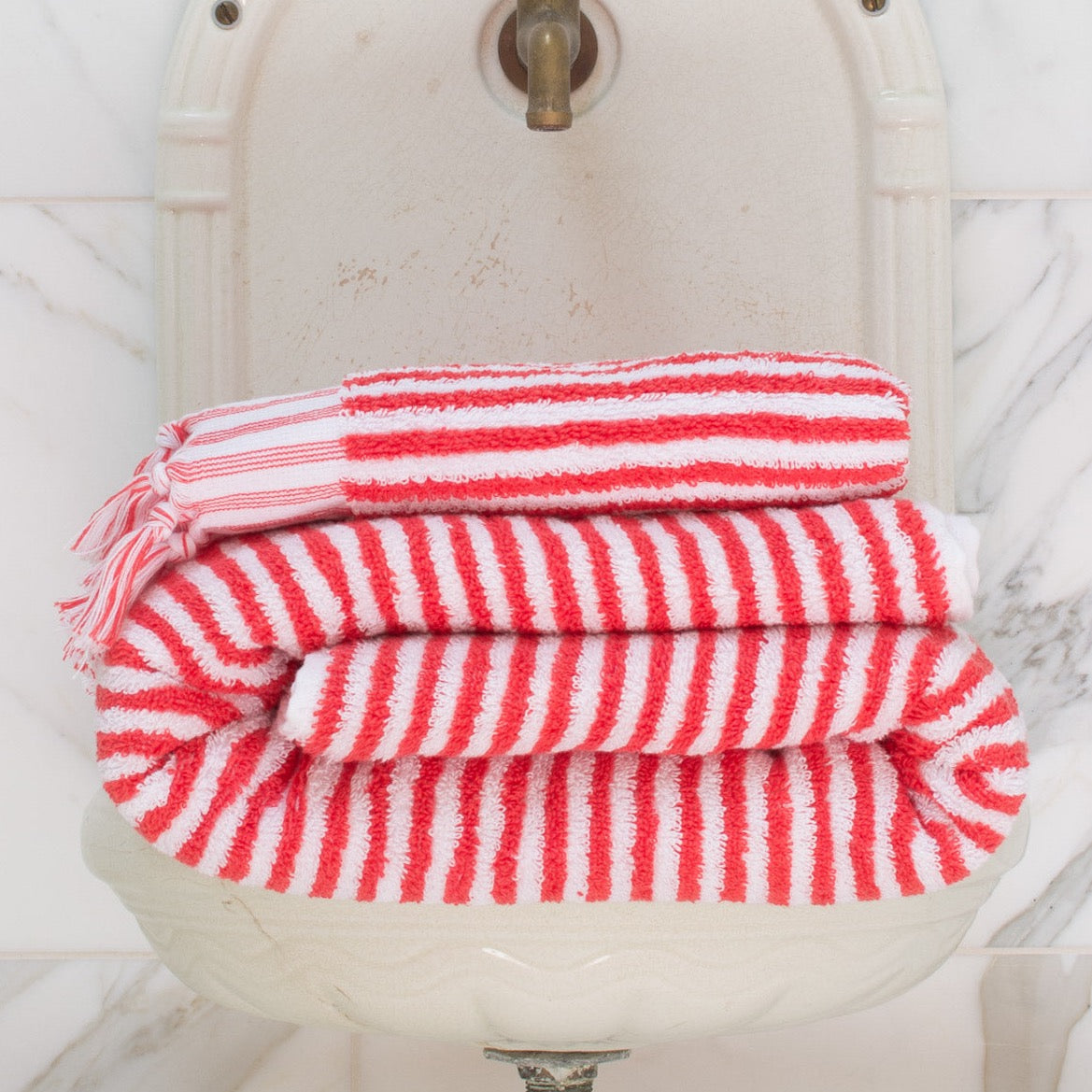 Serviette rouge corail